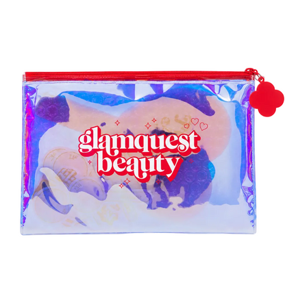 A holographic clear makeup pouch with a red zipper, a red flower charm, and 'glamquest beauty' printed in red on the front, shown against a plain white background.