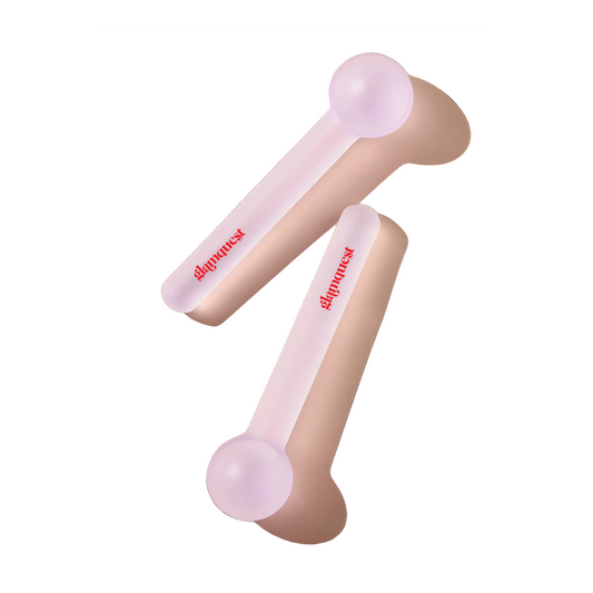 Two Glamquest-branded pink facial roller tools with round ball tips, displayed on a white background.